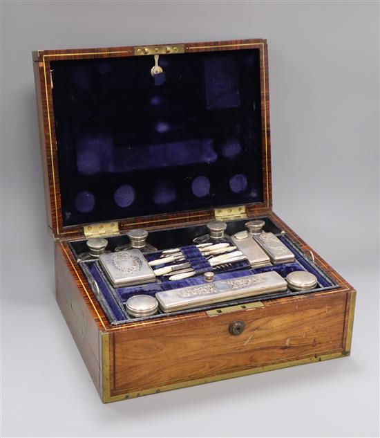 A 19th century rosewood and brass mounted vanity case, plated mounts